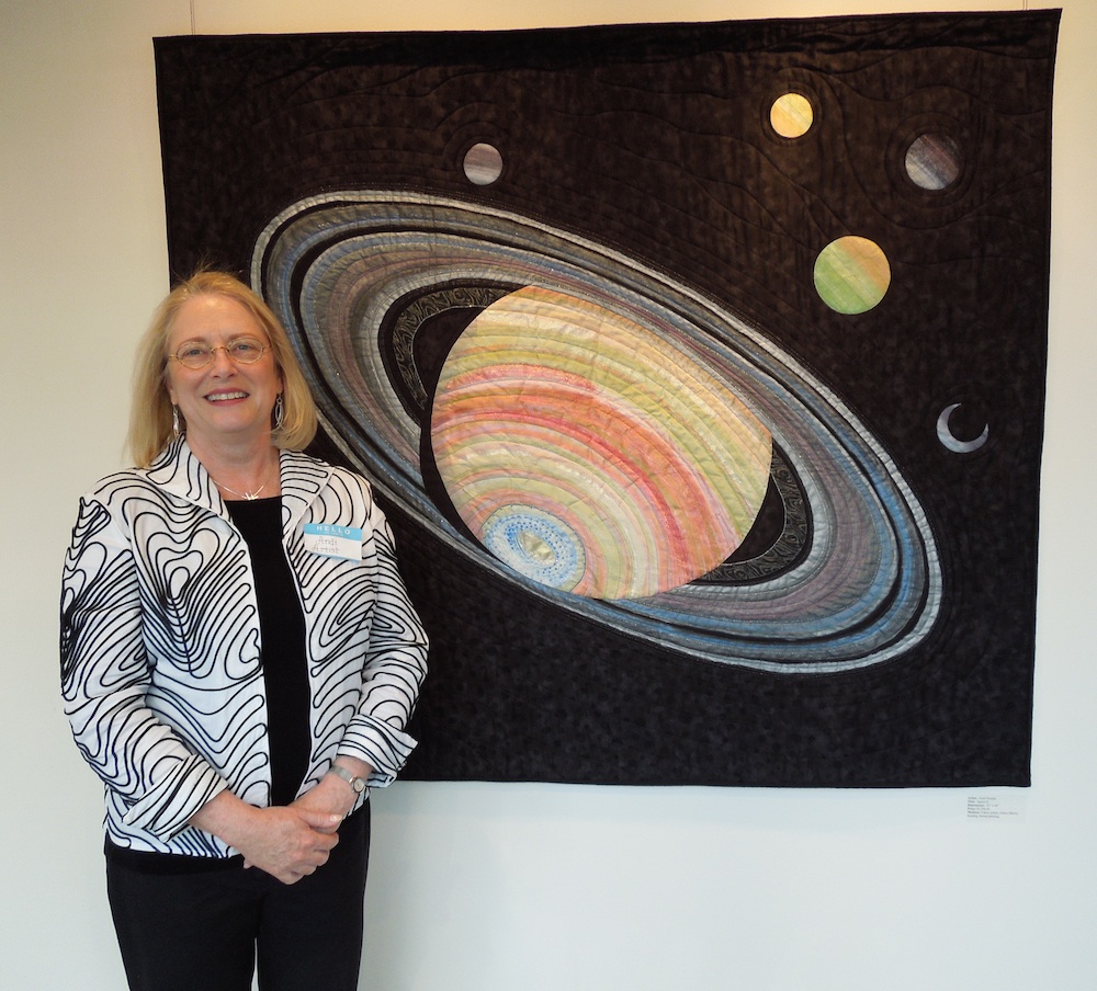 Andi Perejda with her Art Quilt, "Saturn II" Andi Perejda with her Art Quilt, "Saturn II"