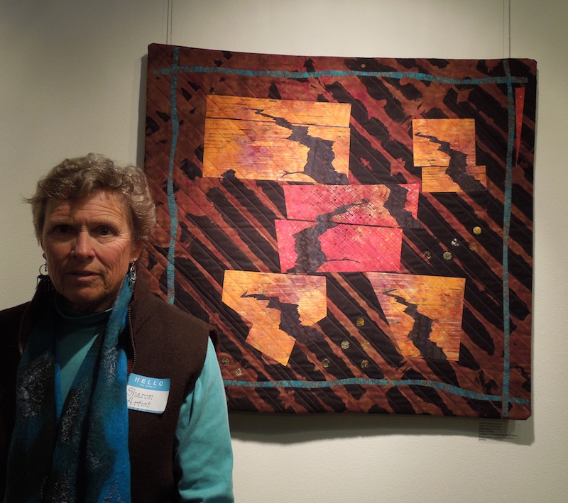 Sharon Emerson with her Art Quilt, "Tectonic Trysts" Sharon Emerson with her Art Quilt, "Tectonic Trysts"