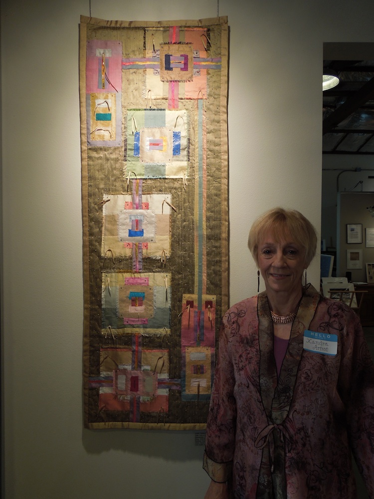 Xandra Shaw with with her Art Quilt "Ode to Albers." Xandra Shaw with with her Art Quilt "Ode to Albers."